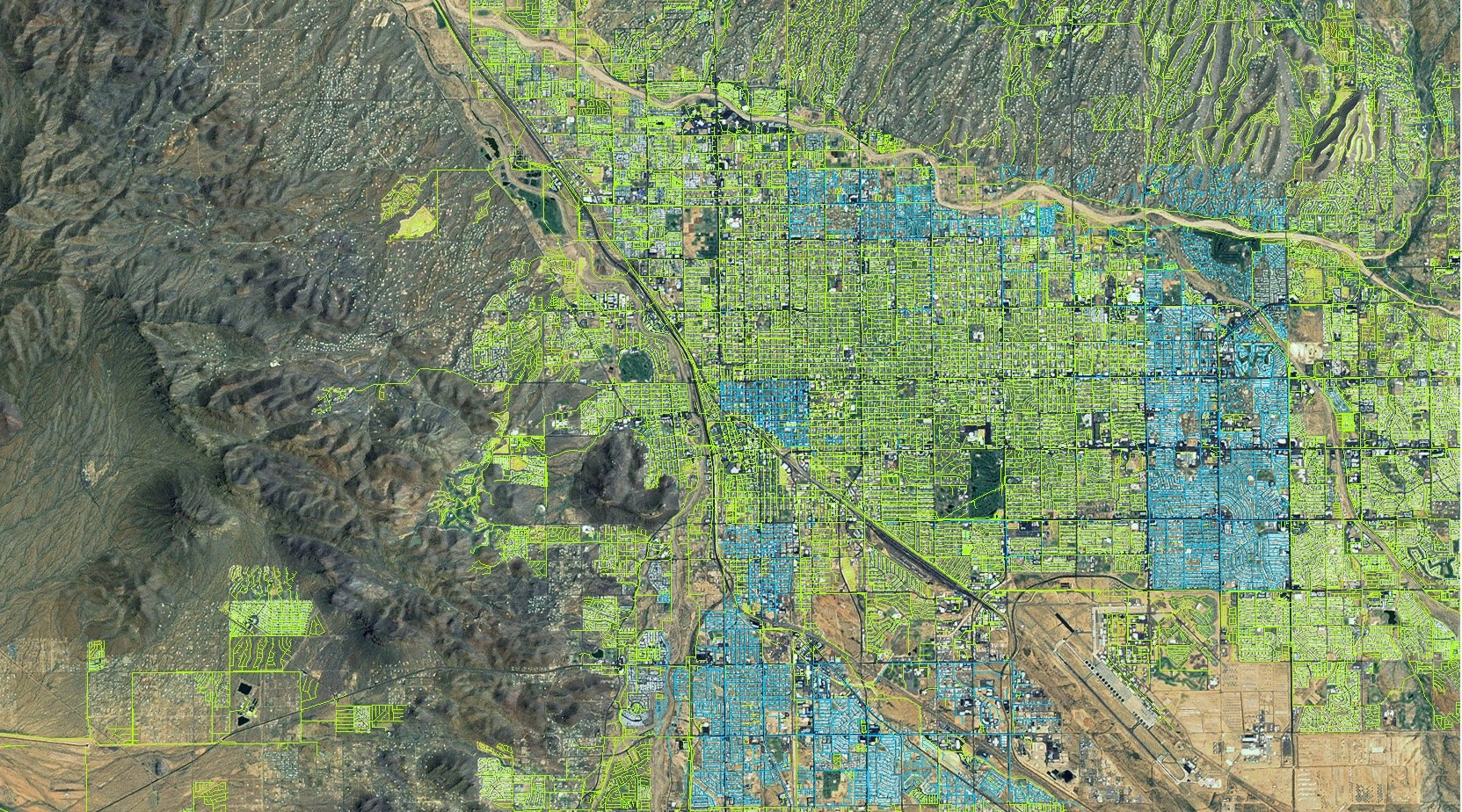 an aerial view of the city of Phoenix with GIS mapping data overlaid.